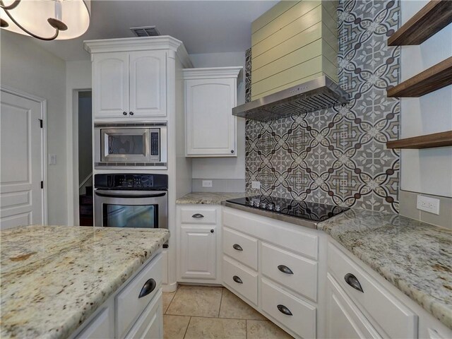 6134 Strasbourg Dr, Corpus Christi, TX 78414 - kitchen featuring stainless steel appliances, open shelves, custom exhaust hood, tasteful backsplash, and light stone countertops