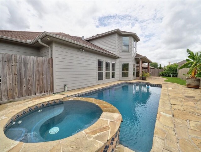 6134 Strasbourg Dr, Corpus Christi, TX 78414 - view of swimming pool featuring a patio, a fenced backyard, and a pool with connected hot tub