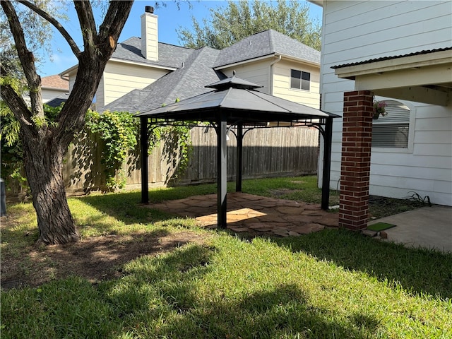 view of yard featuring a patio area and a gazebo