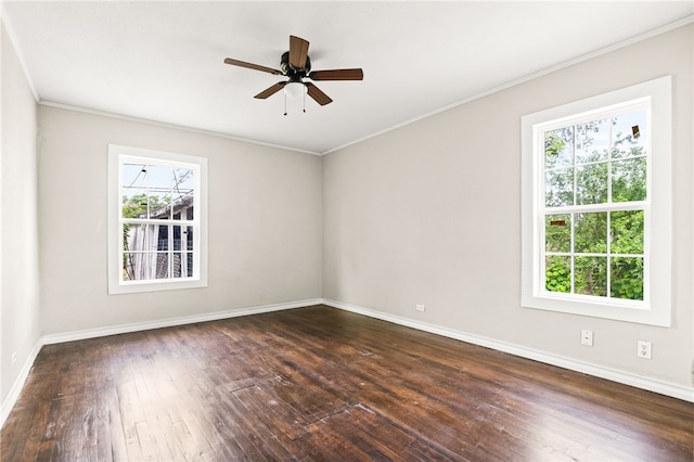 1367 Normandy Dr, Corpus Christi, TX 78415 - spare room with plenty of natural light, baseboards, dark wood-style floors, and ornamental molding