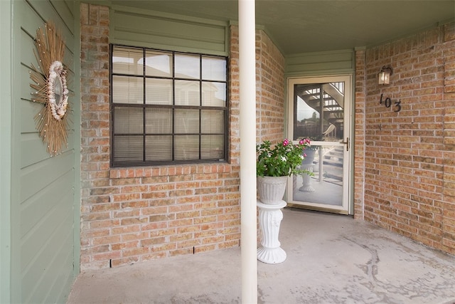 4445 Cedar Pass Dr Unit 103, Corpus Christi, TX 78413 - entrance to property featuring brick siding and a porch