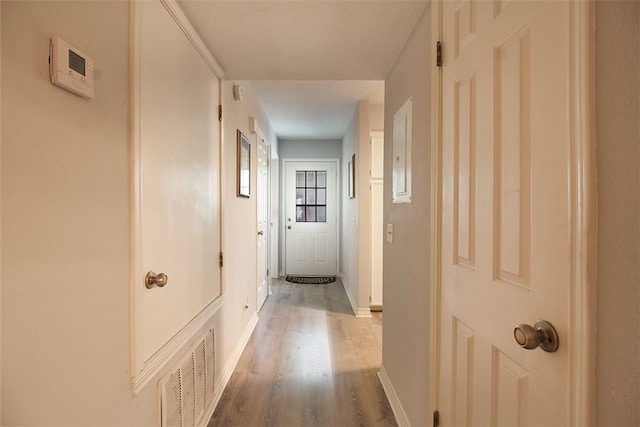 4445 Cedar Pass Dr Unit 103, Corpus Christi, TX 78413 - hall featuring wood finished floors and baseboards