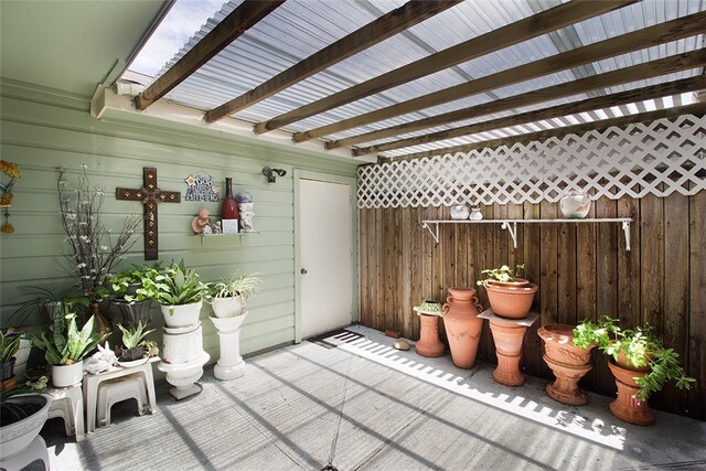 4445 Cedar Pass Dr Unit 103, Corpus Christi, TX 78413 - view of patio featuring a pergola