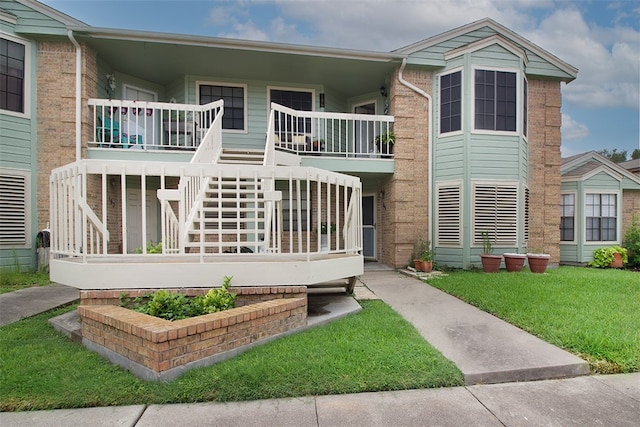 4445 Cedar Pass Dr Unit 103, Corpus Christi, TX 78413 - view of building exterior featuring stairway