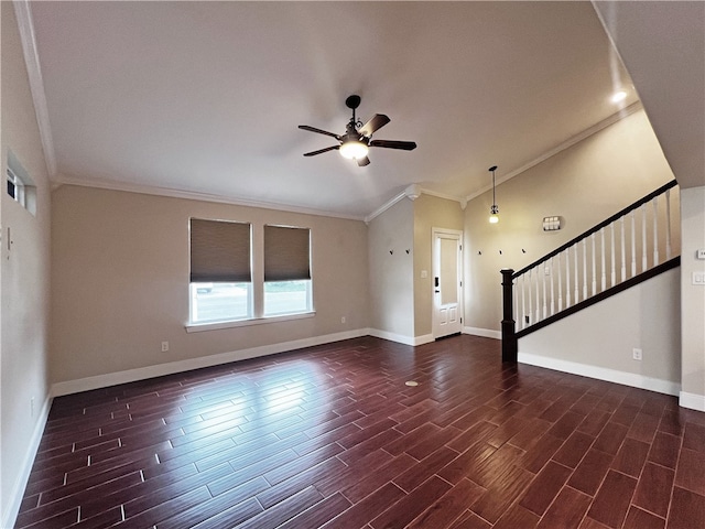 unfurnished living room featuring dark hardwood / wood-style floors, ceiling fan, and crown molding