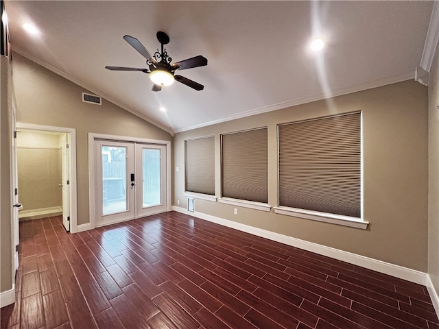 unfurnished room featuring ceiling fan, french doors, dark wood-type flooring, lofted ceiling, and ornamental molding