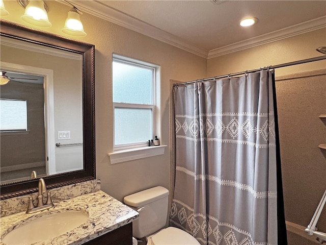 bathroom featuring vanity, curtained shower, toilet, and crown molding