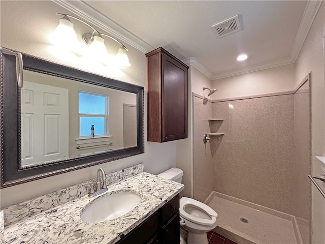 bathroom featuring vanity, toilet, ornamental molding, and walk in shower