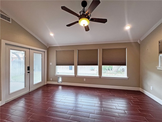 spare room featuring french doors, a healthy amount of sunlight, and ornamental molding