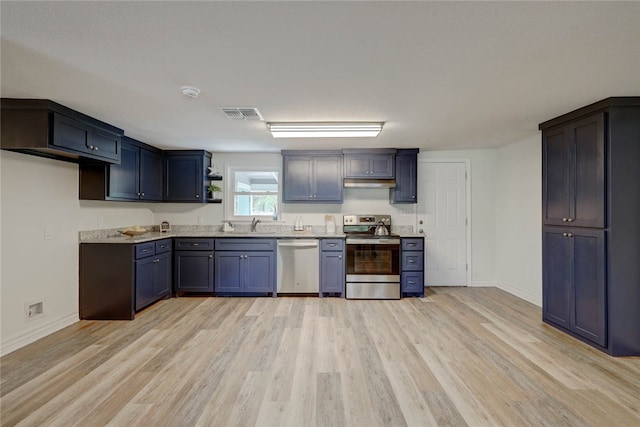 kitchen featuring appliances with stainless steel finishes and light hardwood / wood-style floors