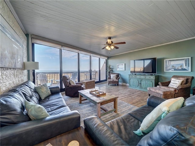 living room featuring hardwood / wood-style flooring, ceiling fan, crown molding, and wood ceiling