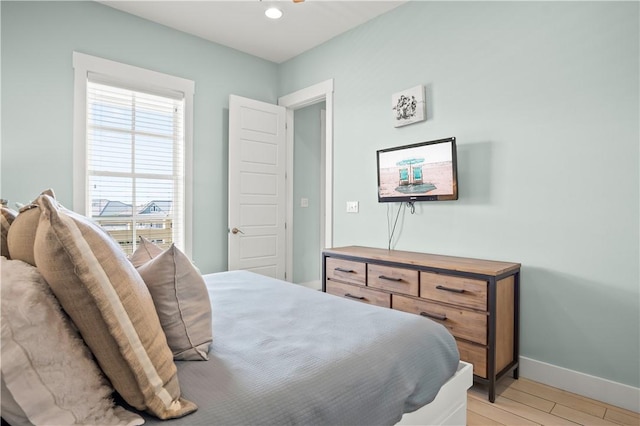 bedroom with light wood-type flooring