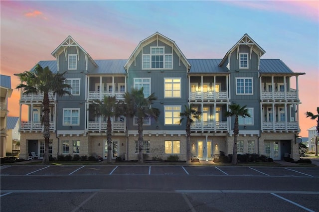 view of outdoor building at dusk