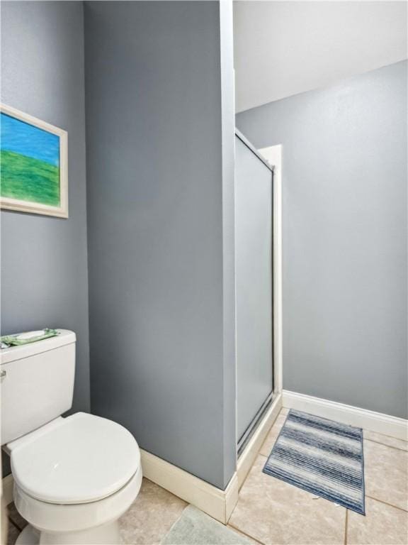 5422 Pressler Dr, Corpus Christi, TX 78413 - full bath with a shower stall, tile patterned floors, baseboards, and toilet