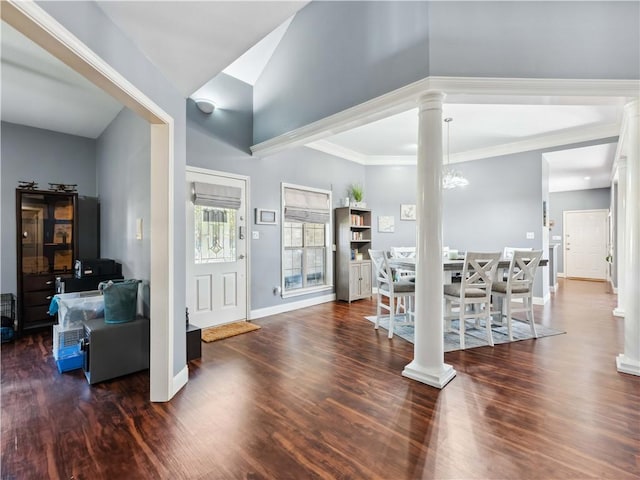 5422 Pressler Dr, Corpus Christi, TX 78413 - foyer entrance with crown molding, ornate columns, wood finished floors, and baseboards