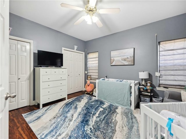 5422 Pressler Dr, Corpus Christi, TX 78413 - bedroom featuring ceiling fan, two closets, and wood finished floors