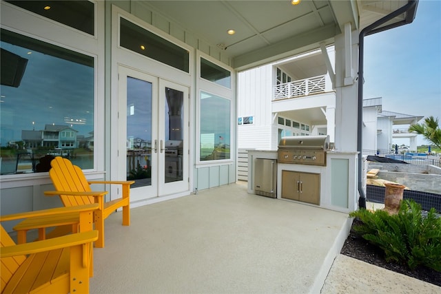 view of patio / terrace featuring french doors and area for grilling