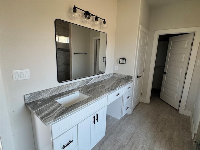 15638 Escapade St, Corpus Christi, TX 78418 - bathroom with vanity and wood finished floors