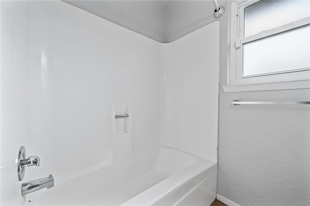 bathroom featuring shower / bath combination