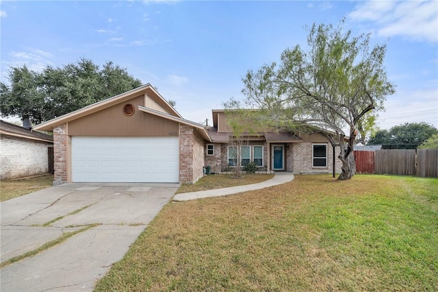 ranch-style home featuring a garage and a front lawn