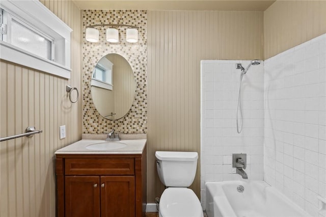 full bathroom with shower / bathtub combination, vanity, and toilet