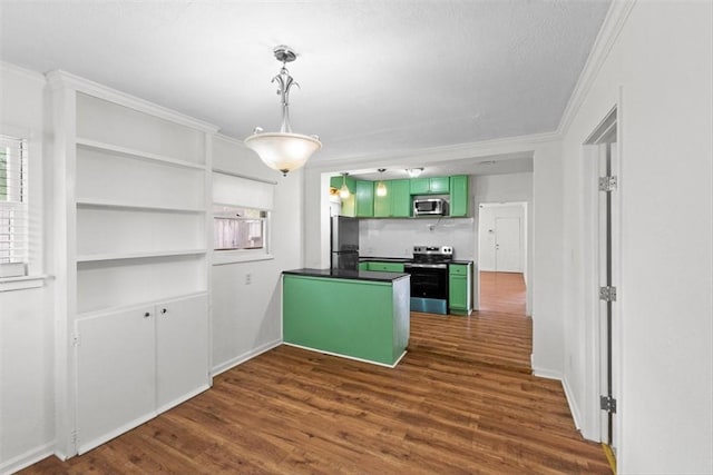 2853 Lawnview St, Corpus Christi, TX 78404 - kitchen with appliances with stainless steel finishes, green cabinets, dark wood-type flooring, ornamental molding, and dark countertops