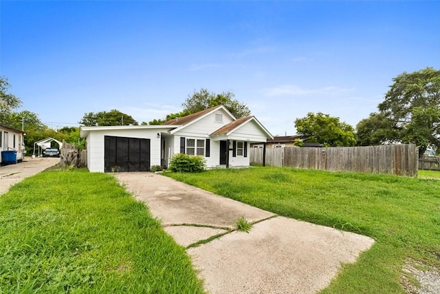 2853 Lawnview St, Corpus Christi, TX 78404 - view of front of home with driveway and an attached garage
