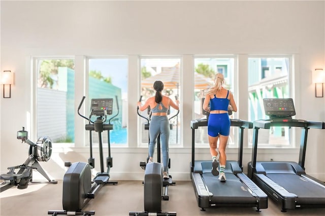 gym featuring baseboards