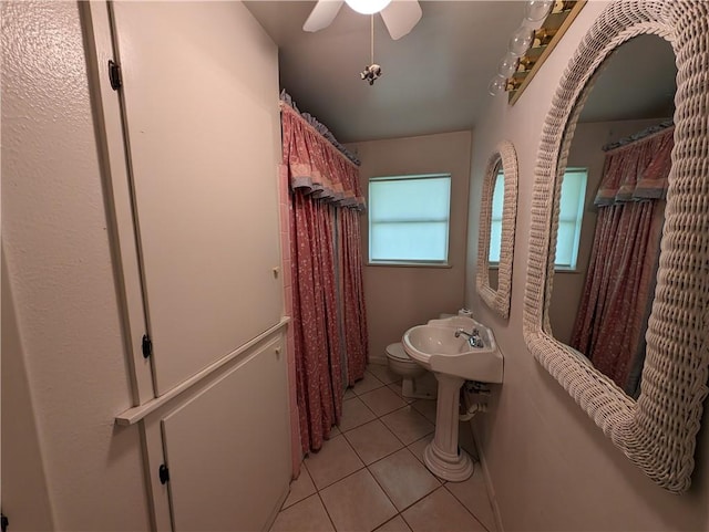 bathroom with tile patterned flooring and ceiling fan