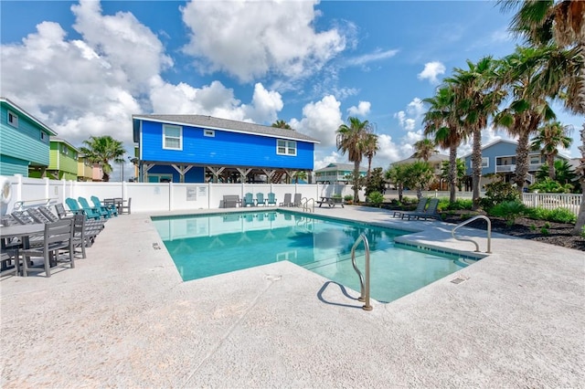 view of swimming pool featuring a patio