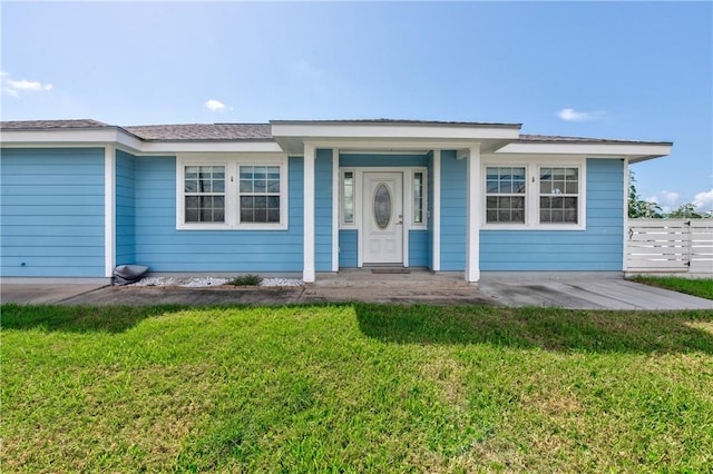 view of front of house with a front lawn