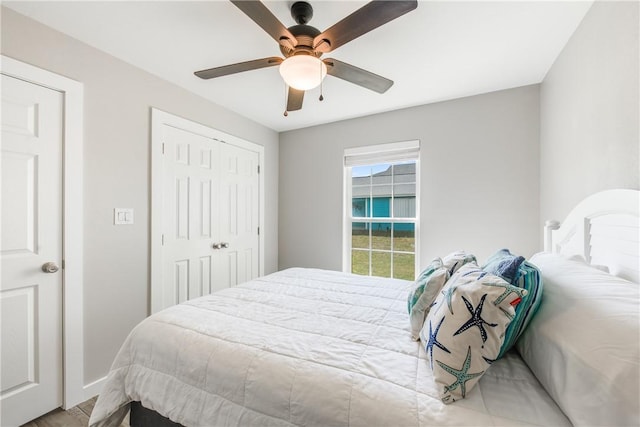 bedroom with a closet and ceiling fan