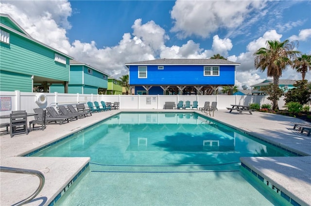 view of pool featuring a patio