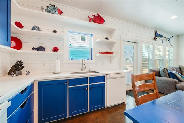 kitchen featuring a sink, open shelves, blue cabinetry, decorative backsplash, and dishwasher