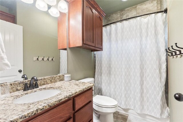 14106 Coquina Bay Ave, Corpus Christi, TX 78418 - bathroom featuring vanity, toilet, and shower / bath combo