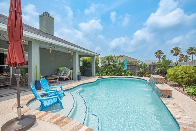 14106 Coquina Bay Ave, Corpus Christi, TX 78418 - view of swimming pool featuring a fenced backyard and a patio