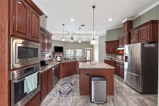 14106 Coquina Bay Ave, Corpus Christi, TX 78418 - kitchen featuring appliances with stainless steel finishes, ceiling fan, decorative backsplash, a peninsula, and recessed lighting