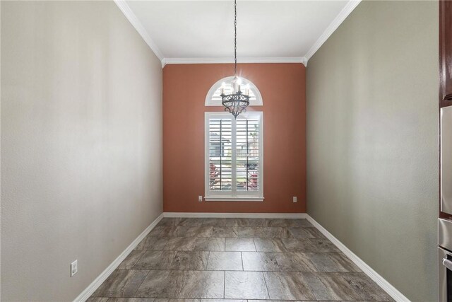 14106 Coquina Bay Ave, Corpus Christi, TX 78418 - empty room with a chandelier, ornamental molding, baseboards, and stone finish flooring