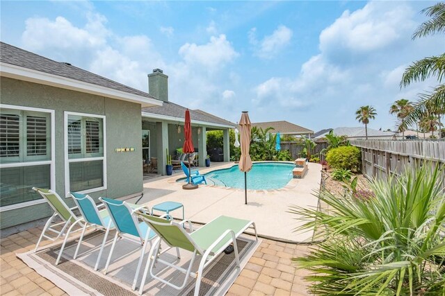 14106 Coquina Bay Ave, Corpus Christi, TX 78418 - view of swimming pool featuring a patio and a fenced backyard