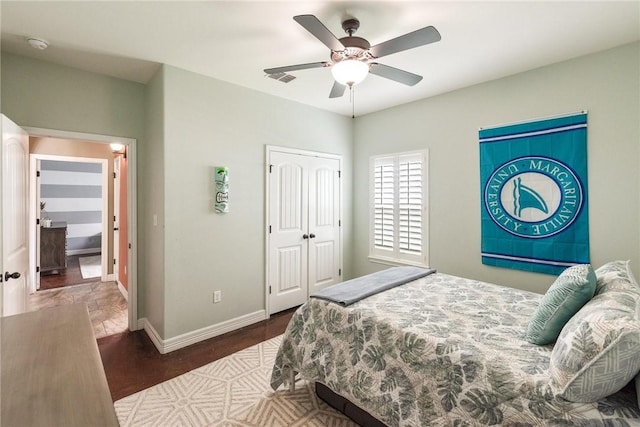 14106 Coquina Bay Ave, Corpus Christi, TX 78418 - bedroom with a closet, baseboards, and ceiling fan