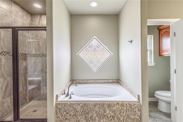 14106 Coquina Bay Ave, Corpus Christi, TX 78418 - full bathroom featuring a bath, toilet, and a stall shower