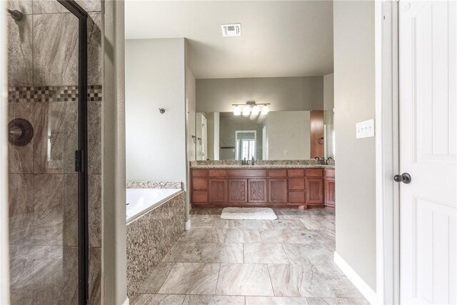 14106 Coquina Bay Ave, Corpus Christi, TX 78418 - bathroom with a bath, a stall shower, and double vanity