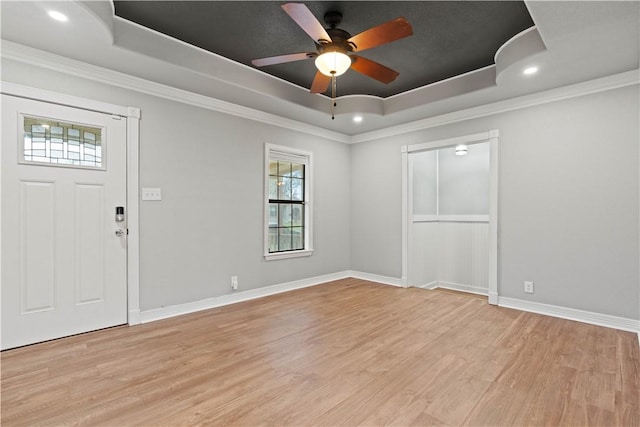 4446 Naples St, Corpus Christi, TX 78415 - entryway featuring a tray ceiling, light wood-style flooring, and baseboards