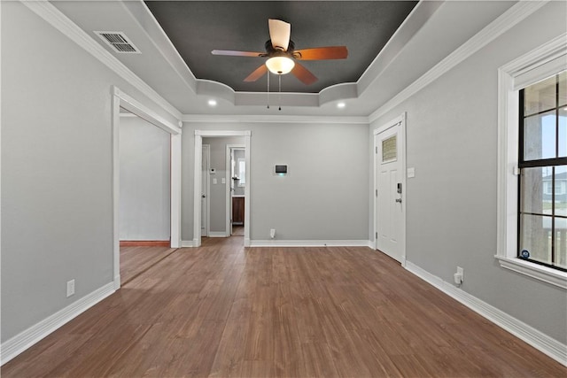 4446 Naples St, Corpus Christi, TX 78415 - foyer with visible vents, a tray ceiling, and baseboards