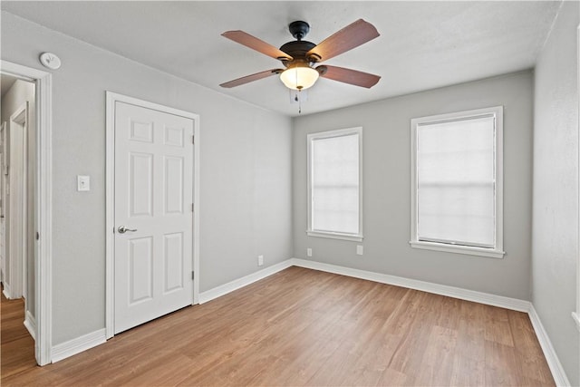 4446 Naples St, Corpus Christi, TX 78415 - empty room featuring ceiling fan, light wood-type flooring, and baseboards