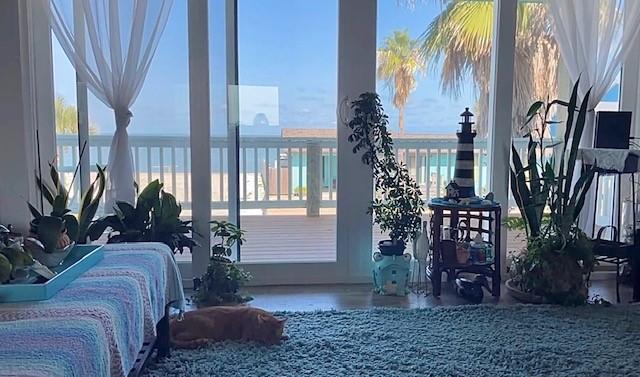 1811 Bay Shore Dr, Rockport, TX 78382 - bedroom with a water view