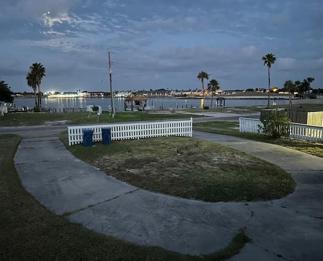 1811 Bay Shore Dr, Rockport, TX 78382 - view of community with a water view and fence