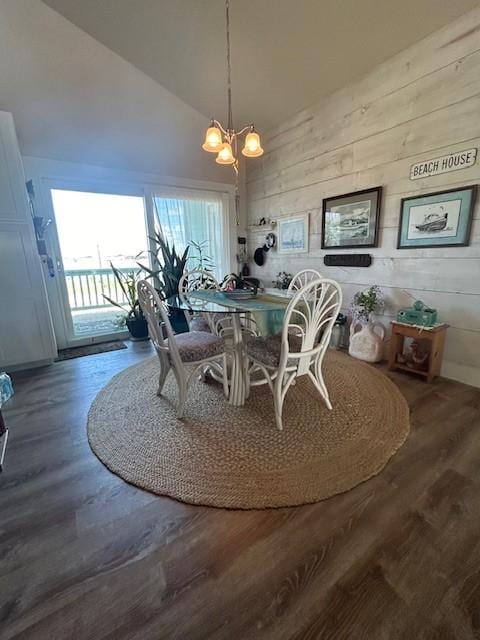 1811 Bay Shore Dr, Rockport, TX 78382 - dining area with a chandelier, wood finished floors, and high vaulted ceiling