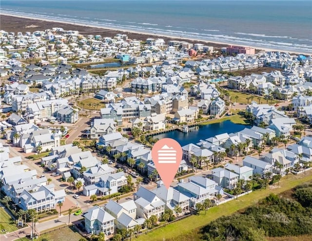 birds eye view of property with a residential view and a water view