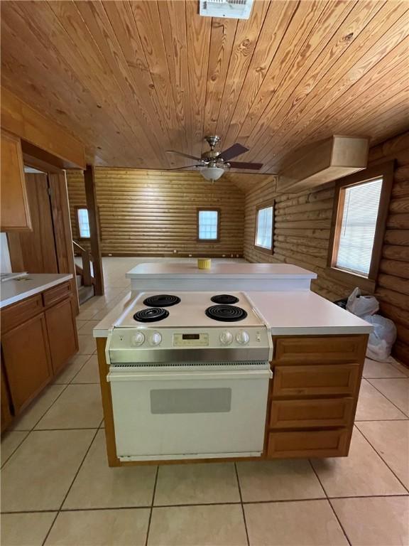 kitchen featuring wood ceiling, ceiling fan, light tile patterned flooring, and white electric range oven